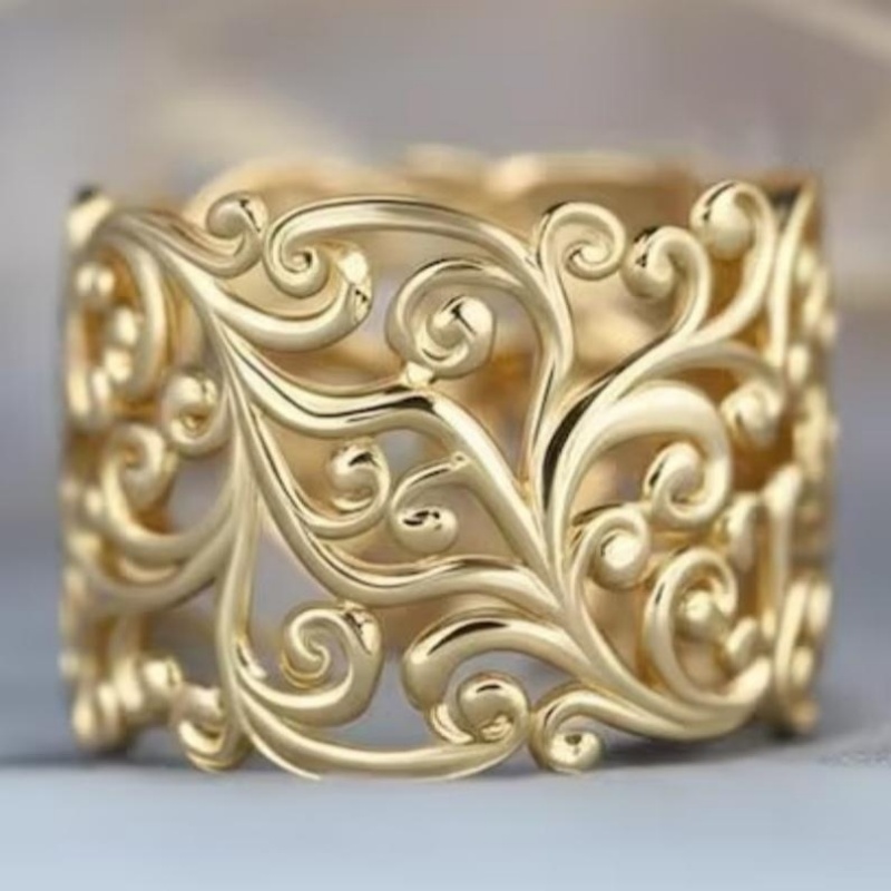 Women's Exquisite Hollow Curled Grass Pattern Carved Ring